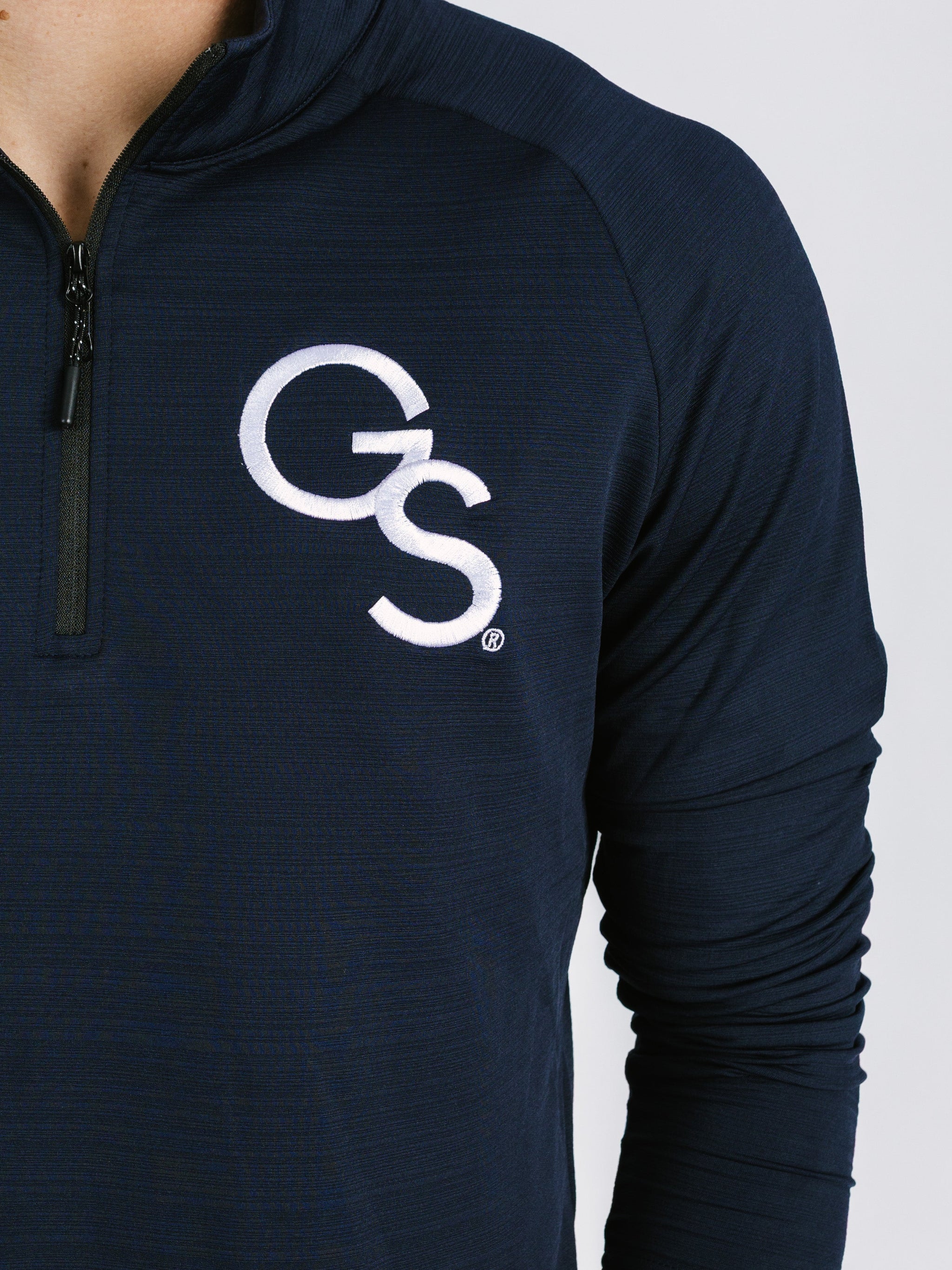 Georgia Southern men's navy "GS" 1/4 zip athletic jacket by Arena Graffiti, featuring logo on front and ribbed cuffs.