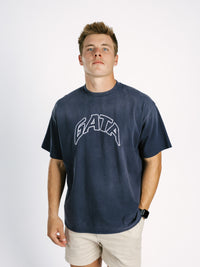 Navy acid wash T-shirt for men featuring embroidered Georgia Southern GATA logo by Arena Graffiti, casual athletic style.