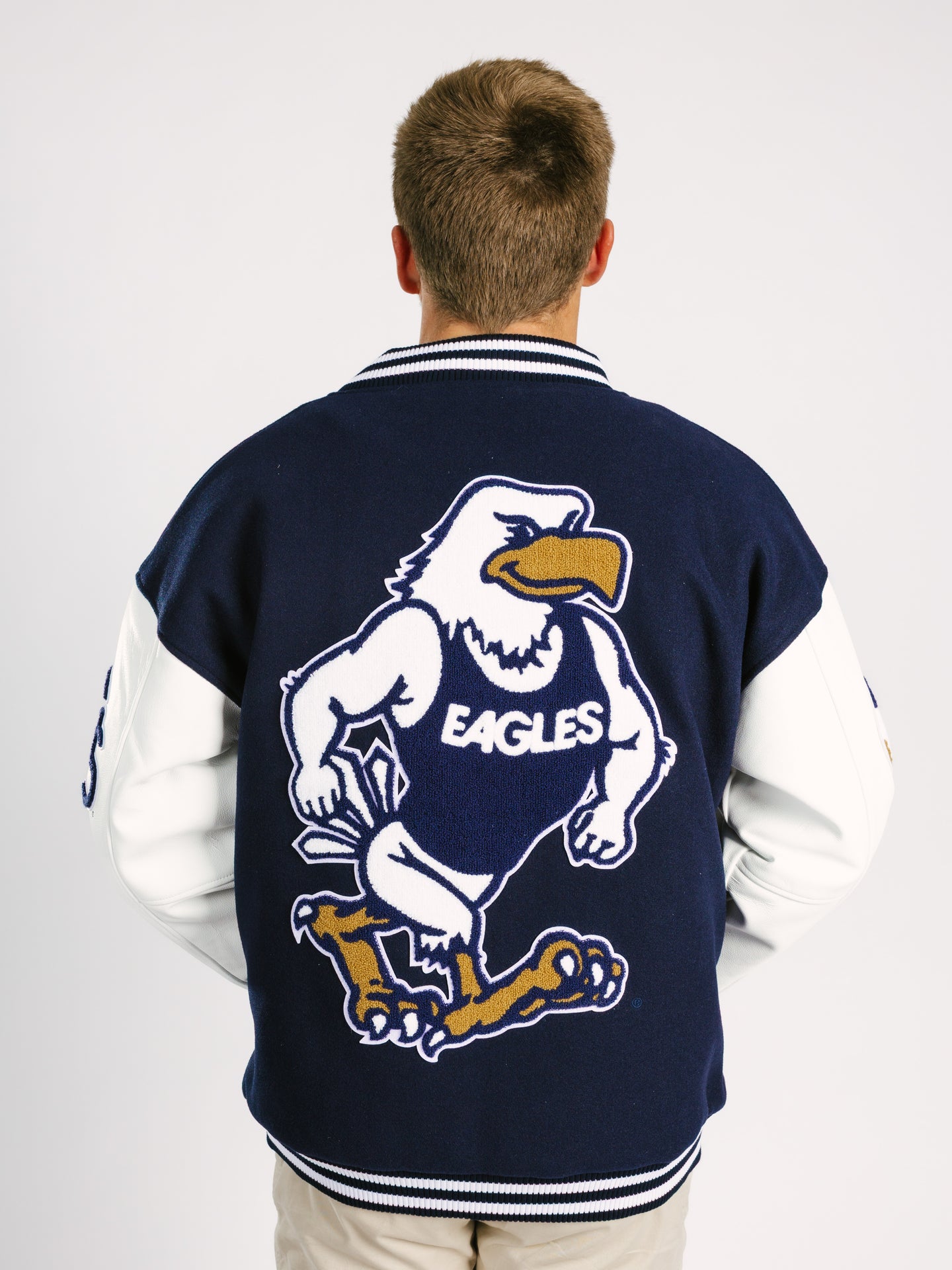 Georgia Southern men's varsity "Strutter" letterman jacket by Arena Graffiti, featuring team logo and classic letterman style.