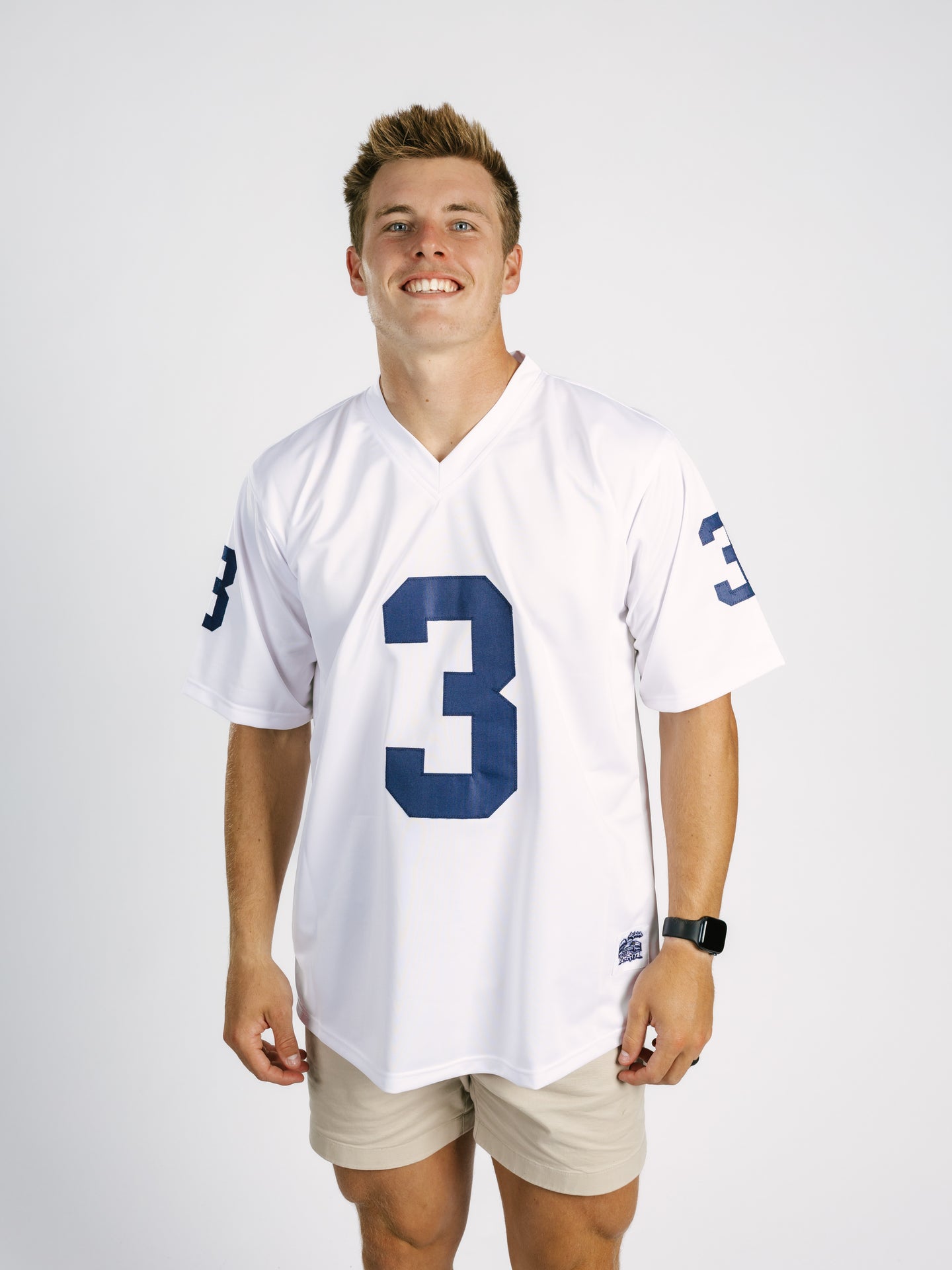 Georgia Southern men's white basketball jersey by Arena Graffiti with "AP" lettering and team logo, displayed on a hanger.