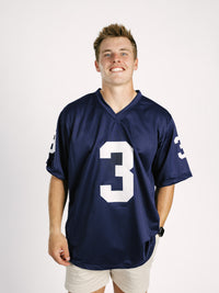 Georgia Southern men's navy jersey by Arena Graffiti featuring "AP" lettering and team logo on the front.
