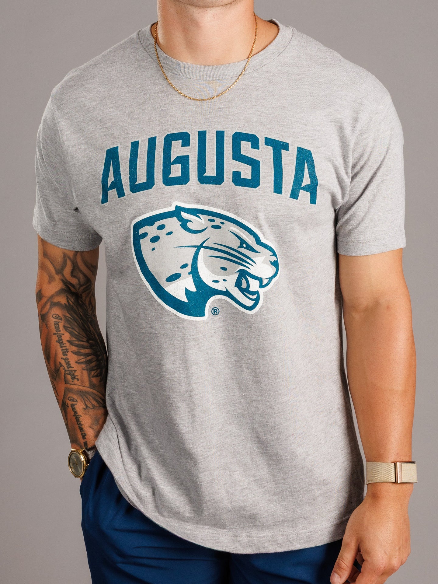 Grey Augusta University men's "Augusta Jag Head" T-shirt by Arena Graffiti featuring university logo and team mascot.