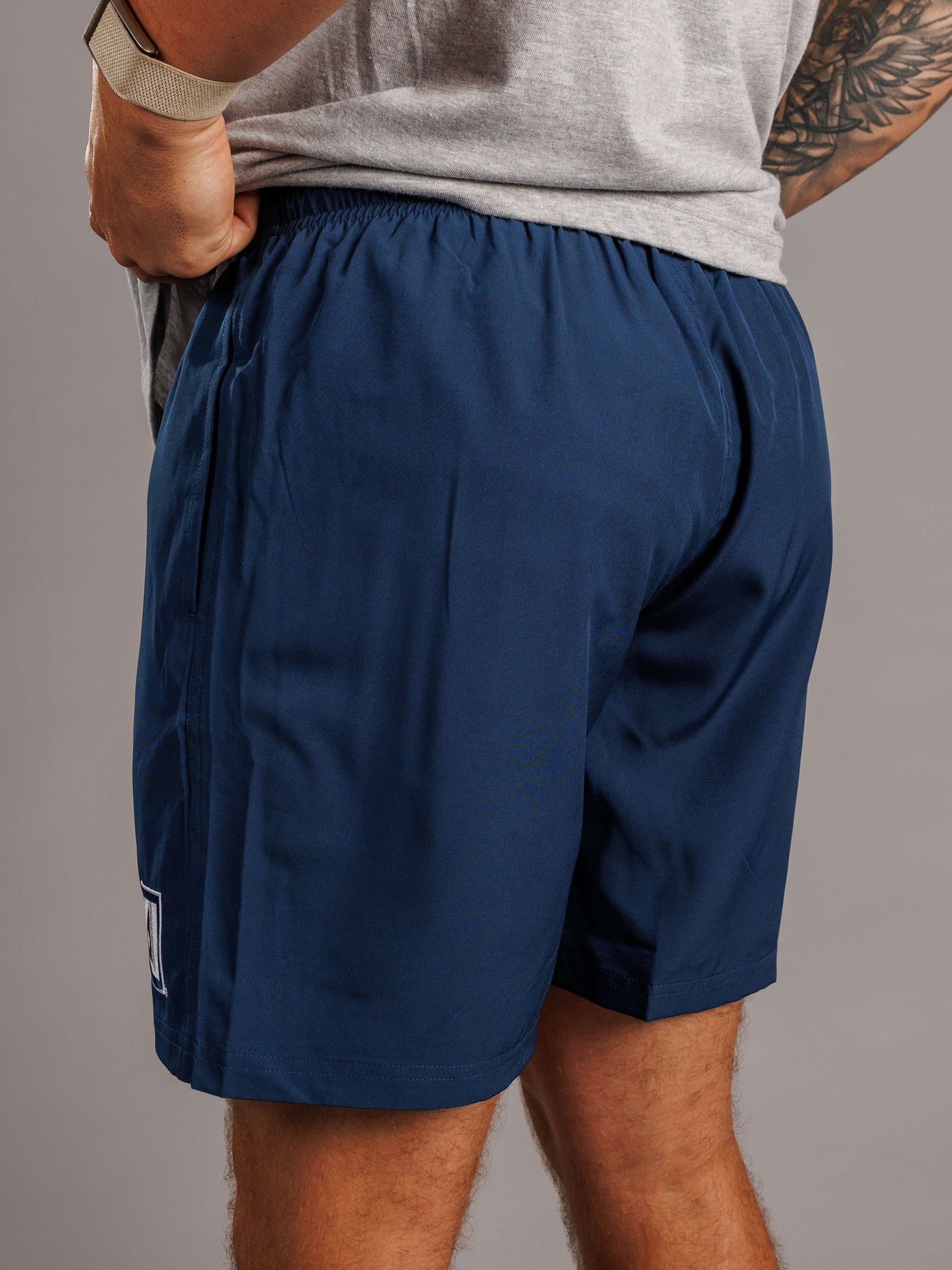 Arena Graffiti Augusta University men's navy lined shorts with the "A" logo, featuring a comfortable athletic fit and navy lining.