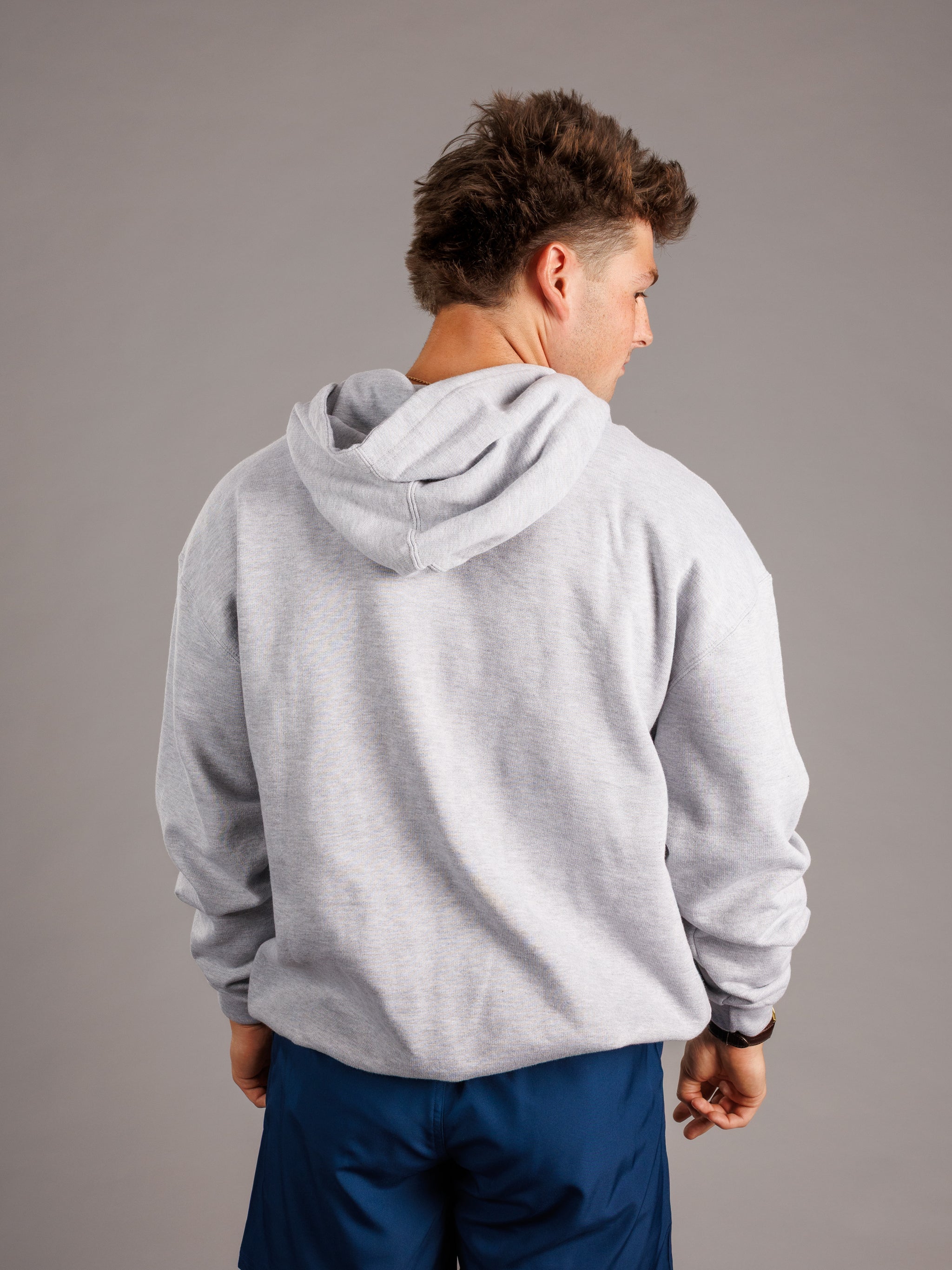 Arena Graffiti Augusta University Men's "Walking Jag" grey hoodie featuring university logo and comfortable fit on a model.