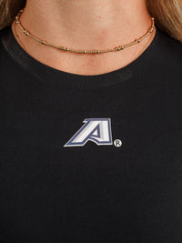 Arena Graffiti women's high neck padded active top with "A" logo, designed for sports and athletic wear.