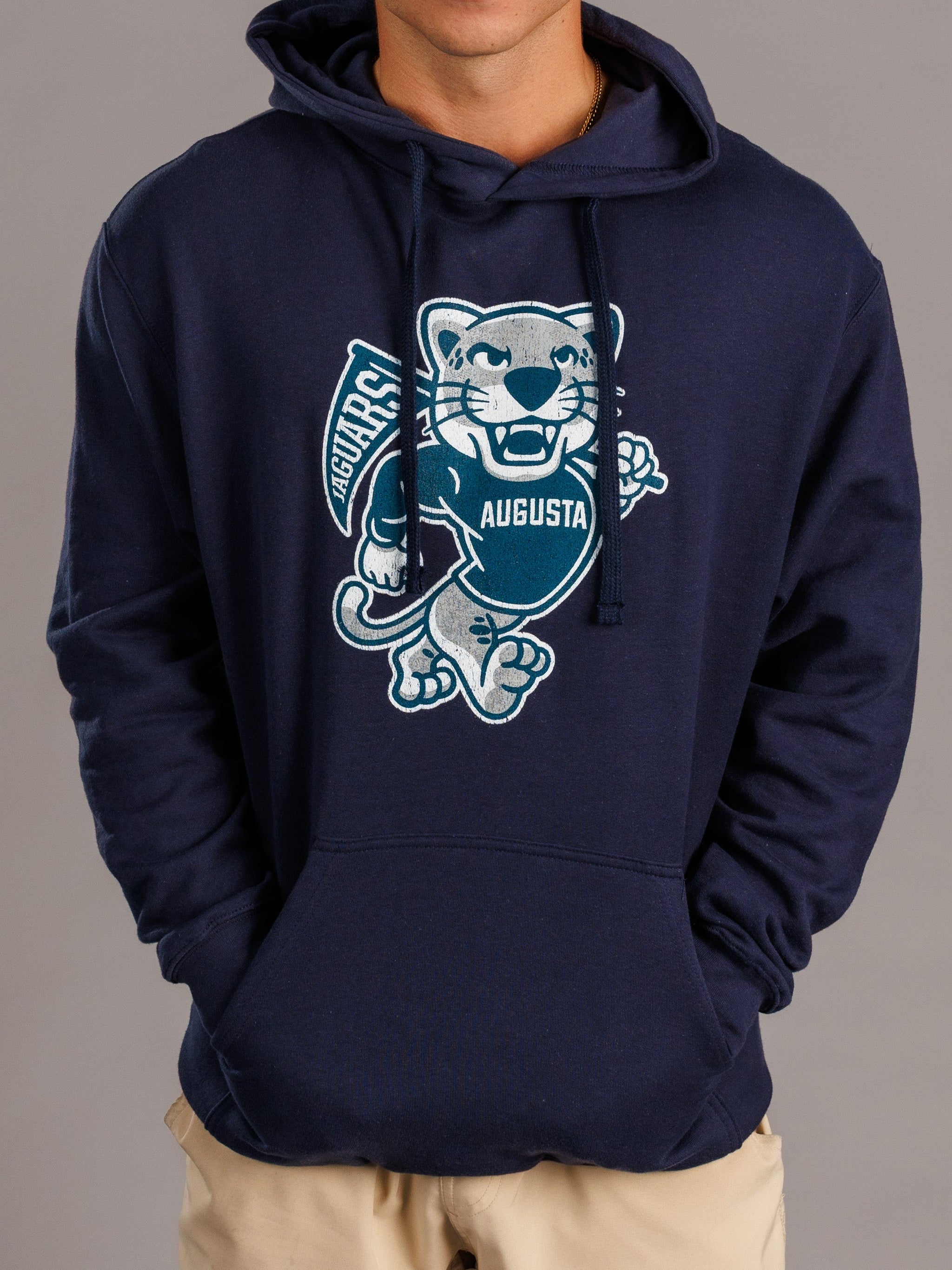 Men's navy hoodie featuring Augusta University "Walking Jag" logo by Arena Graffiti, casual athletic wear with front pocket and drawstrings.