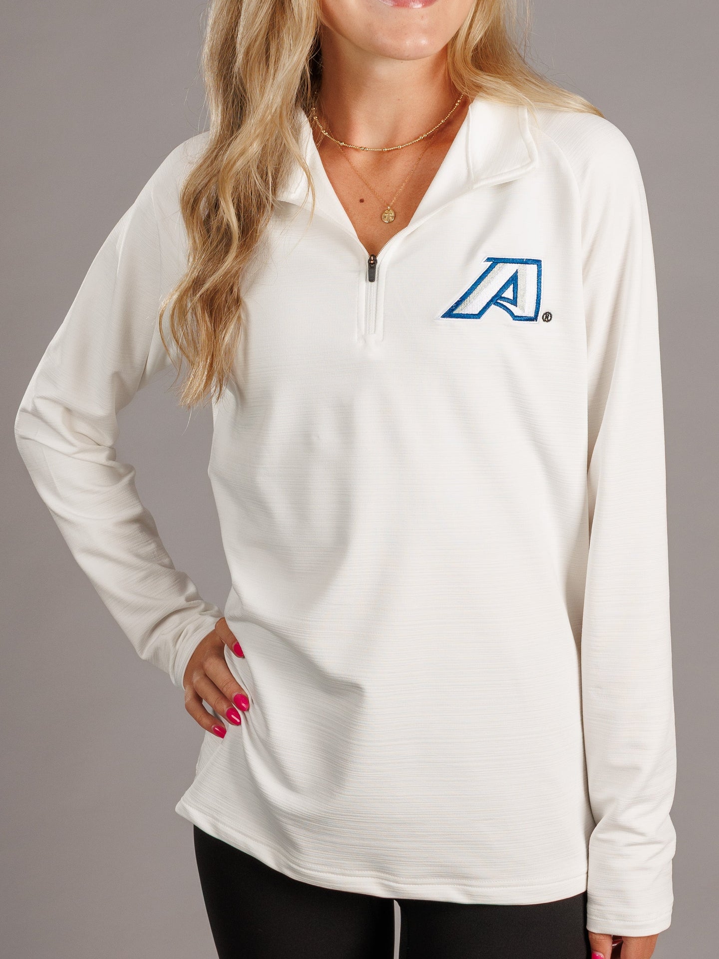 White men's quarter zip sweatshirt with "A" logo from Augusta University by Arena Graffiti, shown on a hanger.