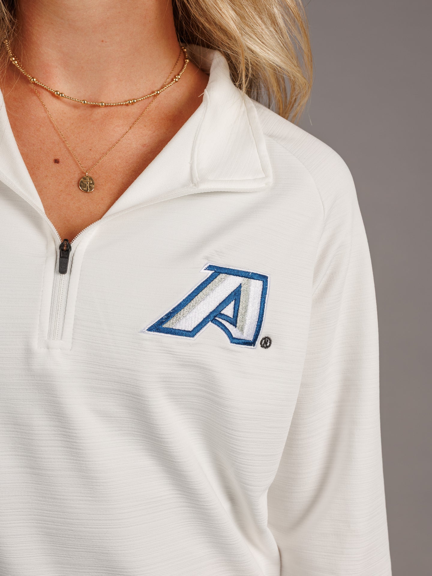 Arena Graffiti Augusta University men's white quarter zip top with the letter "A" logo on the chest.