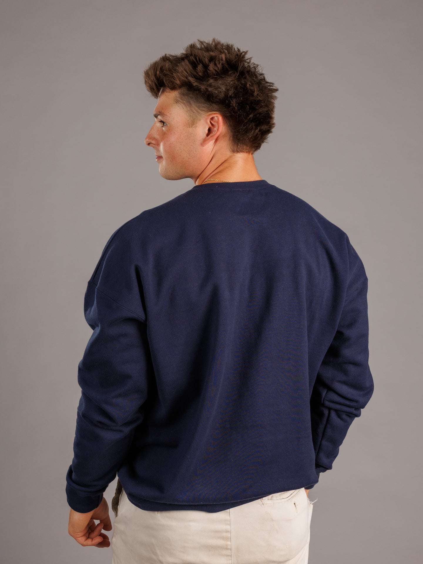 Navy crewneck sweatshirt for men's Augusta University Jaguars by Arena Graffiti, featuring team logo and athletic fit.