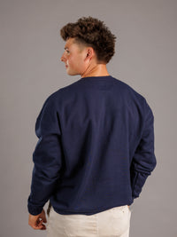 Navy crewneck sweatshirt for men's Augusta University Jaguars by Arena Graffiti, featuring team logo and athletic fit.