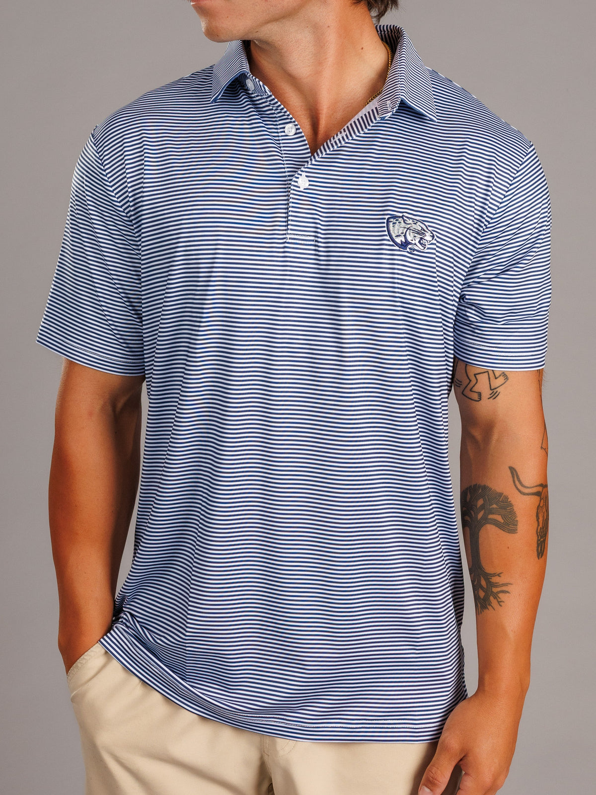 Arena Graffiti Augusta University men's Jag Head striped polo shirt with navy, white, and red horizontal stripes.