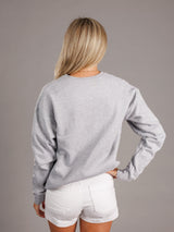 Grey crewneck sweatshirt for men by Arena Graffiti featuring Augusta University "Walking Jag" logo on the front.