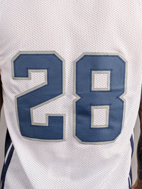 Augusta University men's 28-inch basketball jersey by Arena Graffiti, featuring team logo and athletic design.