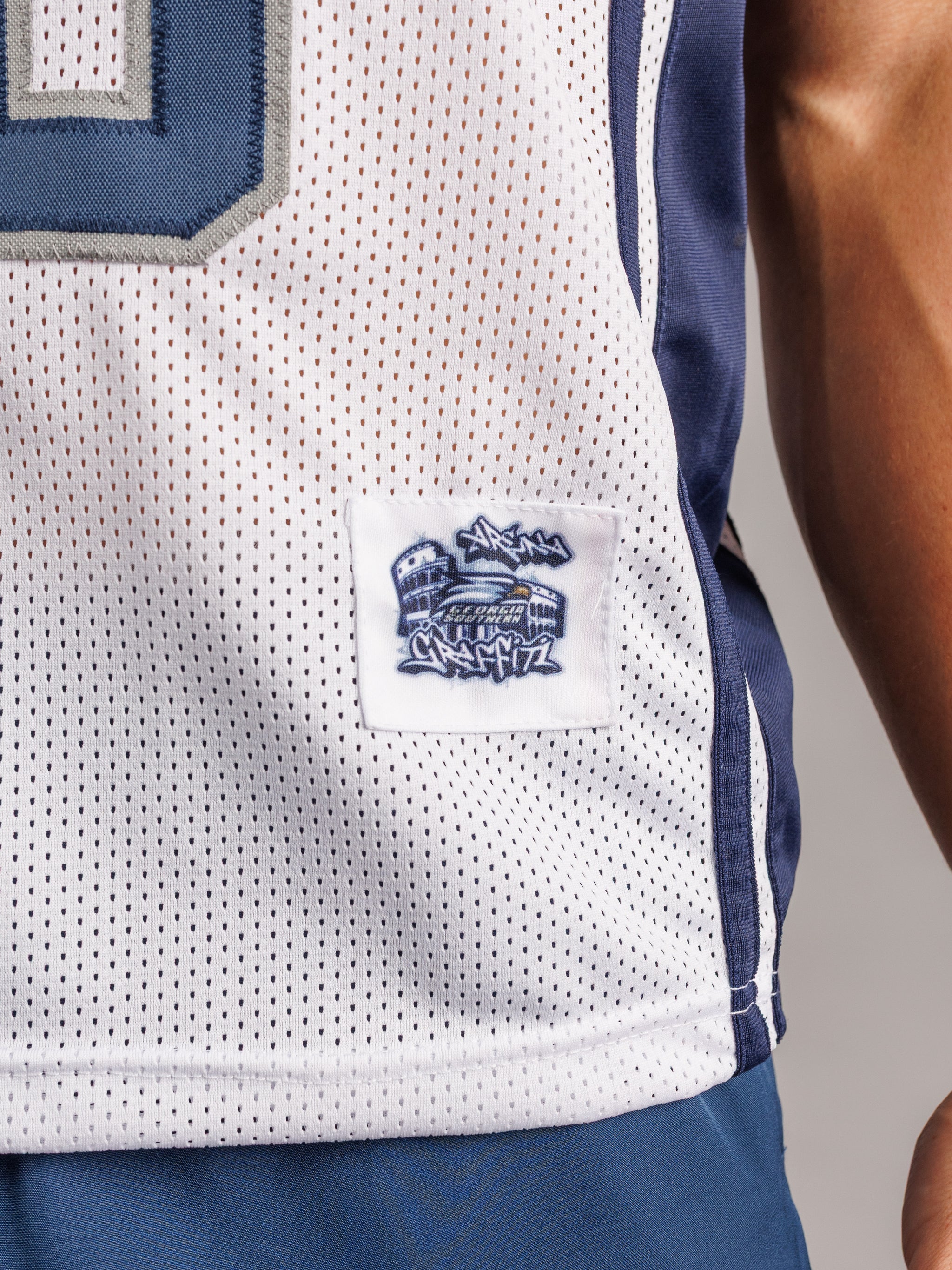 Augusta University men's 28 basketball jersey by Arena Graffiti, featuring team logo and athletic design.
