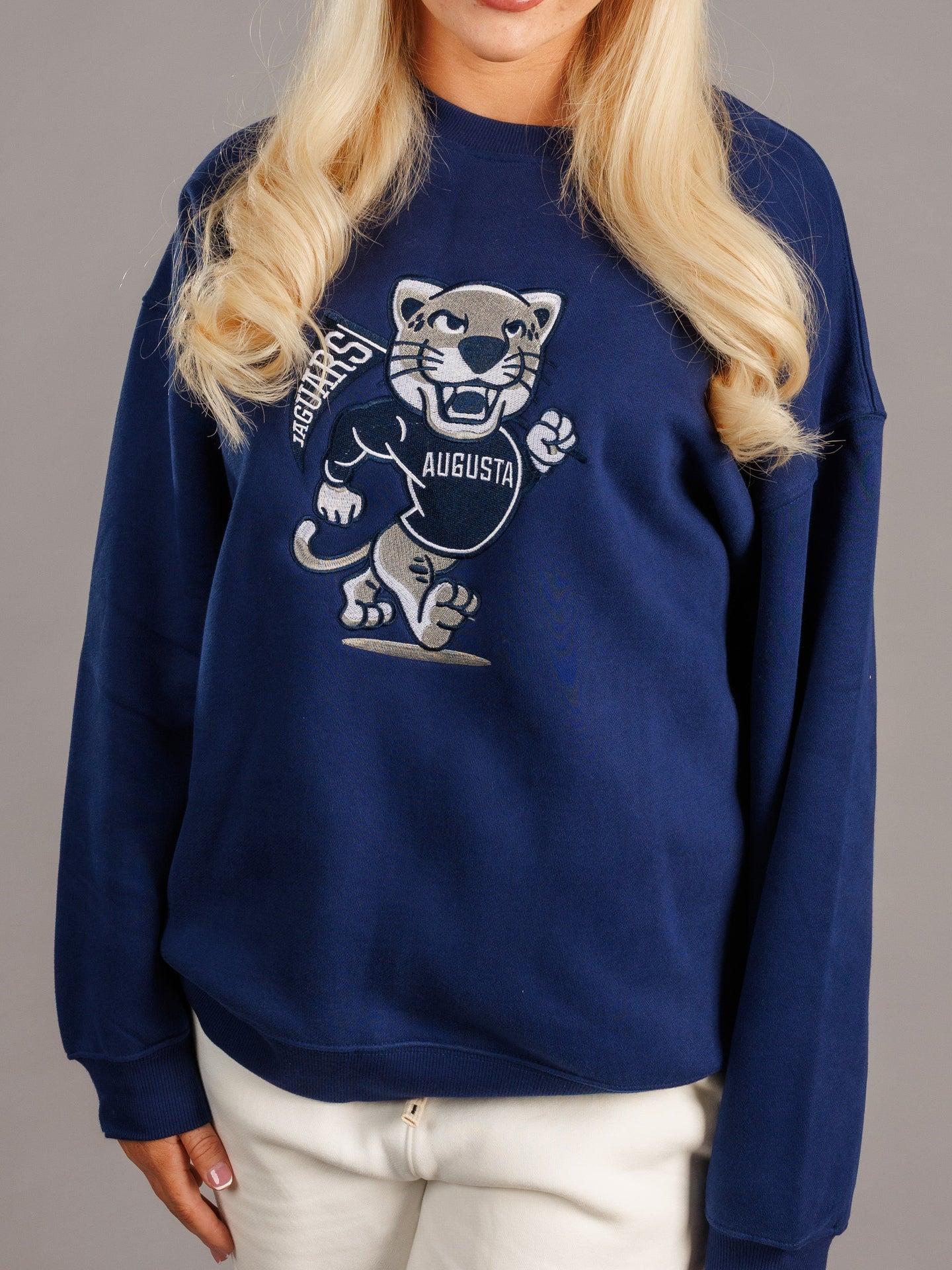 Arena Graffiti Augusta University Men's Walking Jag heavyweight crewneck sweatshirt, front view showing university logo and comfortable fit.