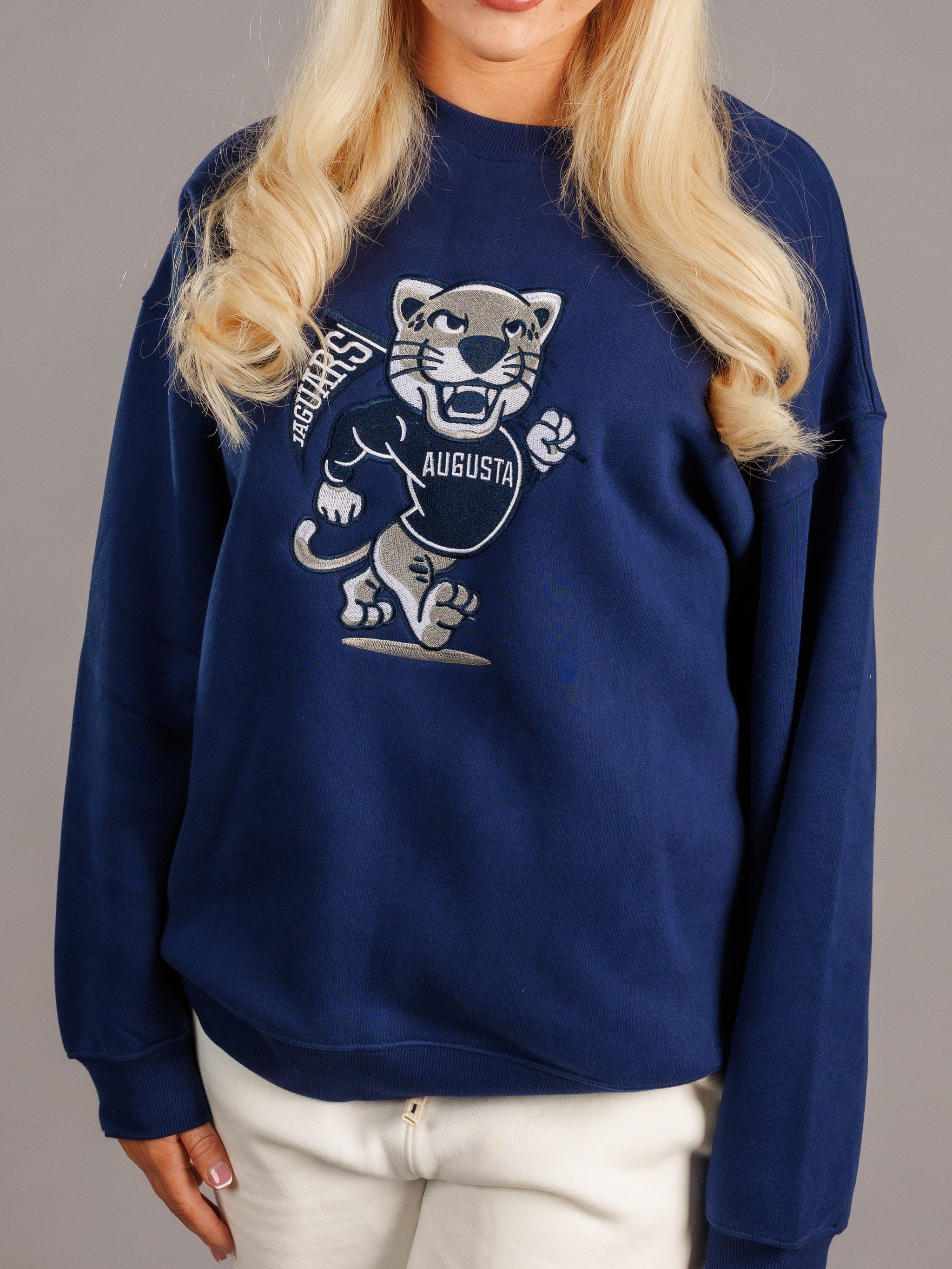 Arena Graffiti Augusta University Men's Walking Jag heavyweight crewneck sweatshirt, front view showing university logo and comfortable fit.