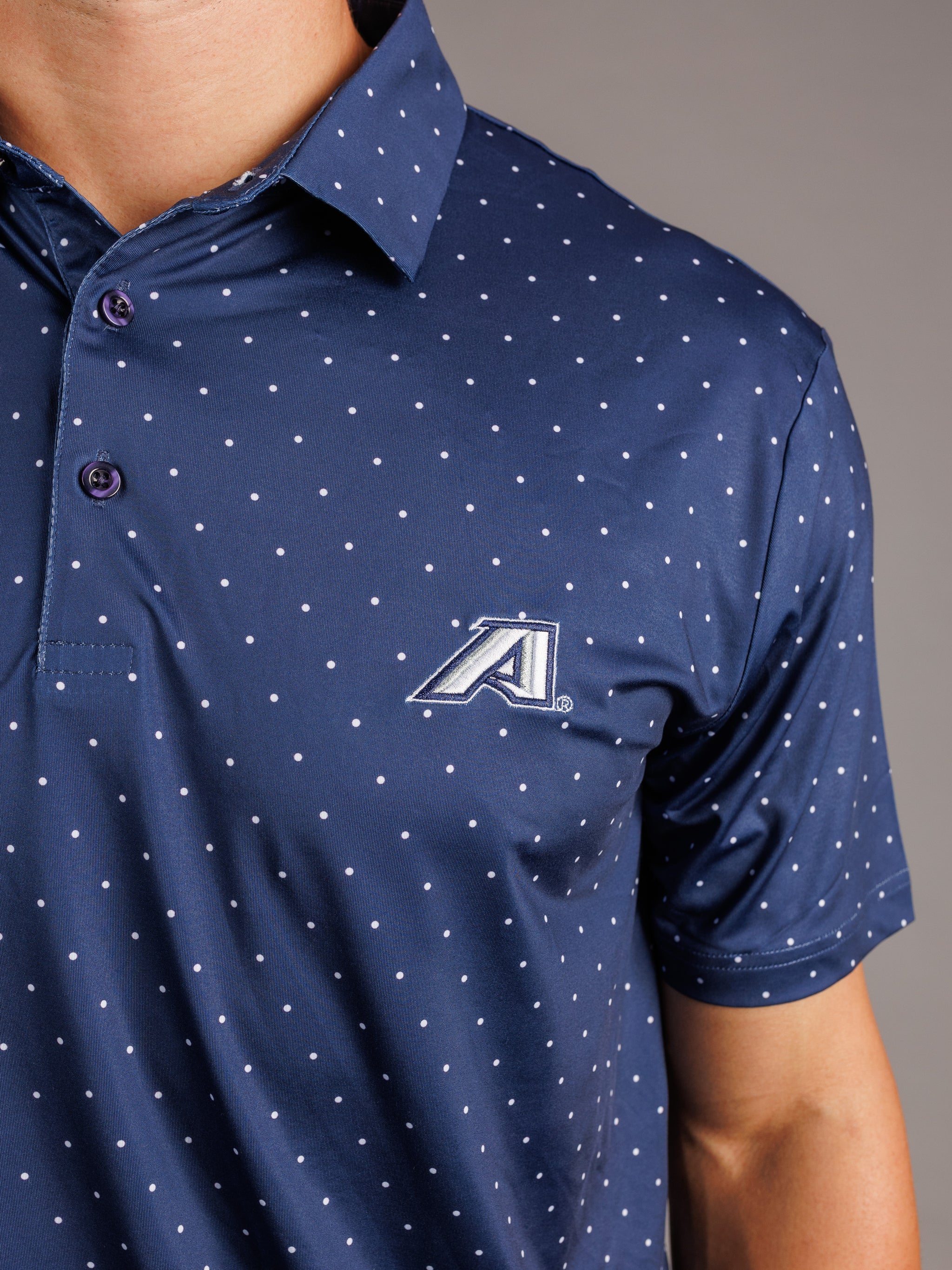 Men's Augusta University "A Dot" Polo by Arena Graffiti, navy blue with embroidered university logo on chest.