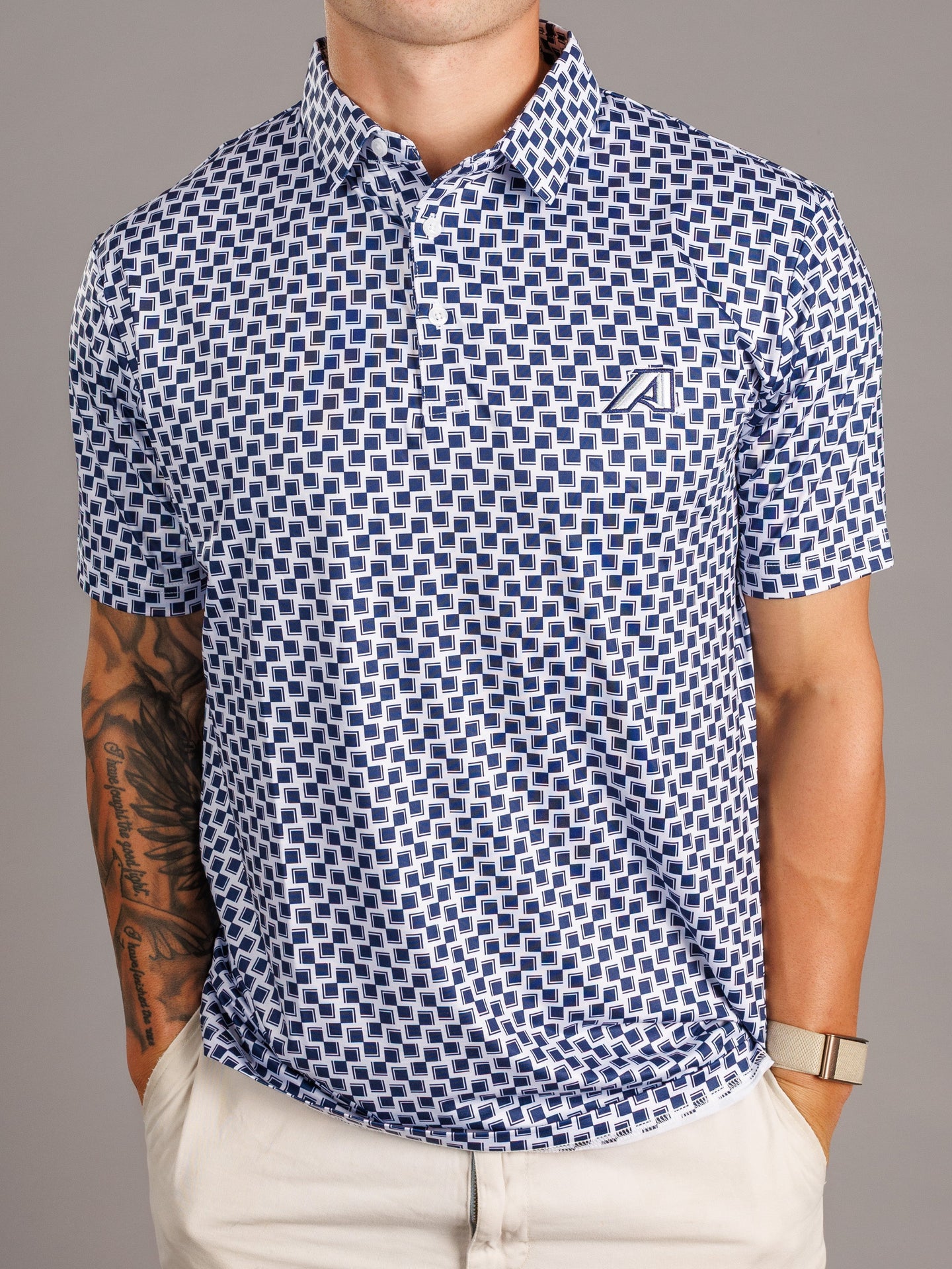 Arena Graffiti Augusta University men's checkered polo shirt featuring an "A" logo, made from comfortable fabric with a classic design.