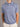 Arena Graffiti Augusta University men's checkered polo shirt featuring an "A" logo, made from comfortable fabric with a classic design.