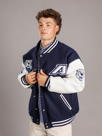 Augusta University men's varsity letterman jacket by Arena Graffiti with university emblem and striped cuff details.