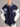 Arena Graffiti Augusta University men's varsity jag letterman jacket with university emblem and striped cuffs, front view.