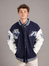Augusta University men's varsity letterman jacket by Arena Graffiti with university logo and striped cuffs, front view.