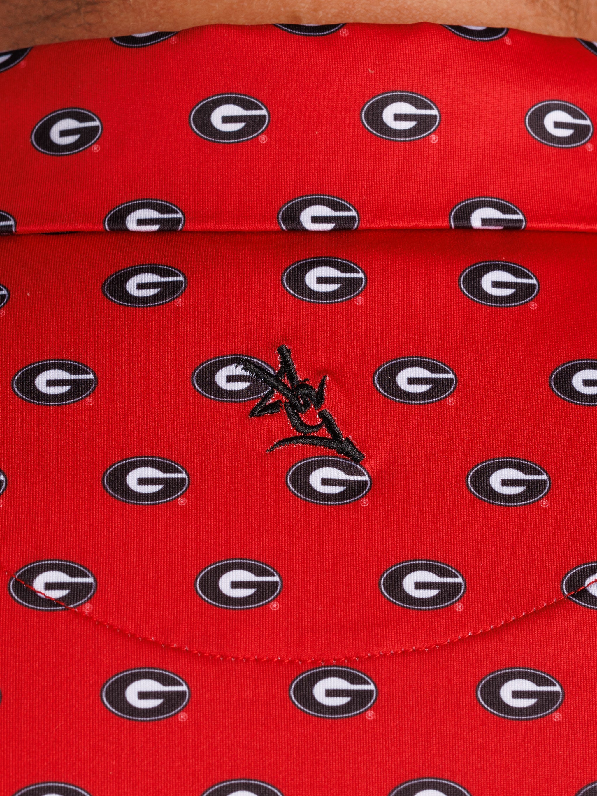 UGA Bulldogs men's "G Repeat" polo shirt by Arena Graffiti, featuring the team logo and athletic fit.