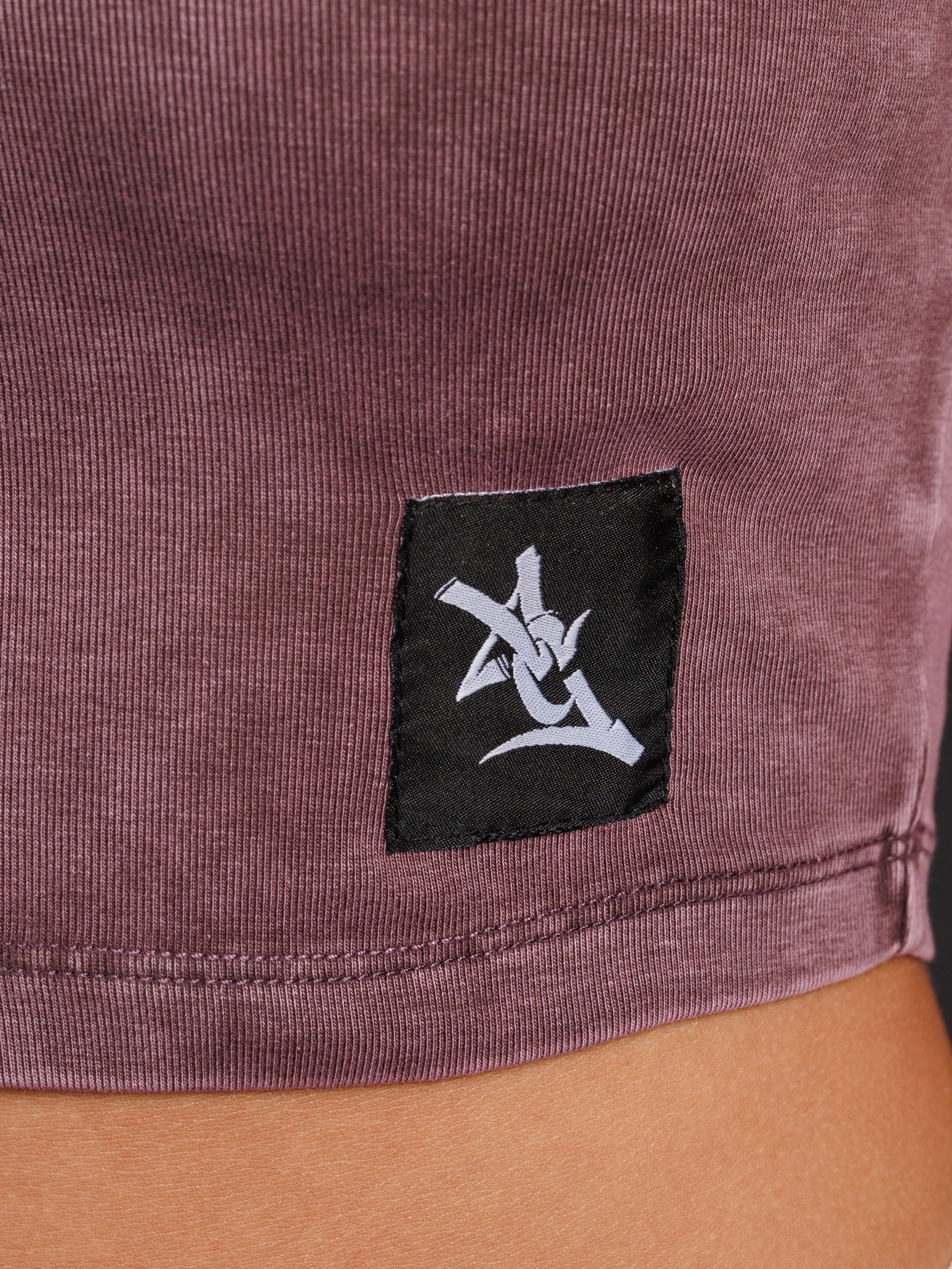 UGA Bulldogs women's Violet UGA crop top by Arena Graffiti, featuring team logo and vibrant purple color, casual athletic style.