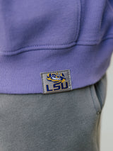 LSU Tigers men's heavyweight crewneck sweatshirt by Arena Graffiti, featuring "LSU" logo and team colors in a close-up shot.