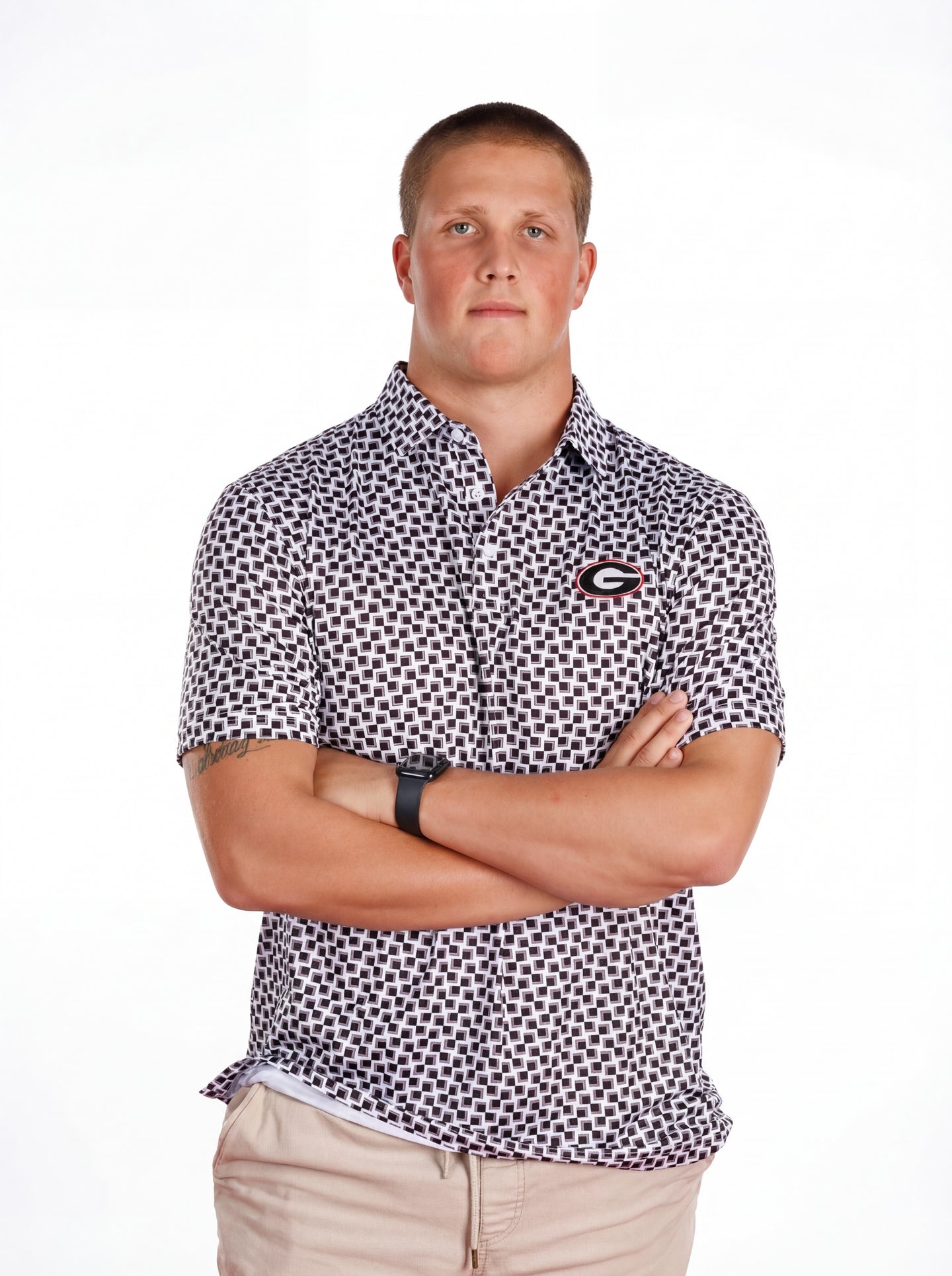 UGA Bulldogs men's checkered mark polo shirt by Arena Graffiti, featuring a classic checkered pattern and team logo.
