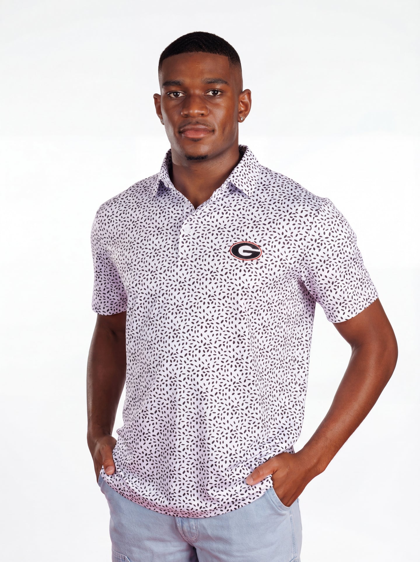 UGA Bulldogs men's Splatter Mark polo shirt by Arena Graffiti with vibrant, abstract splatter design and team logo on front.