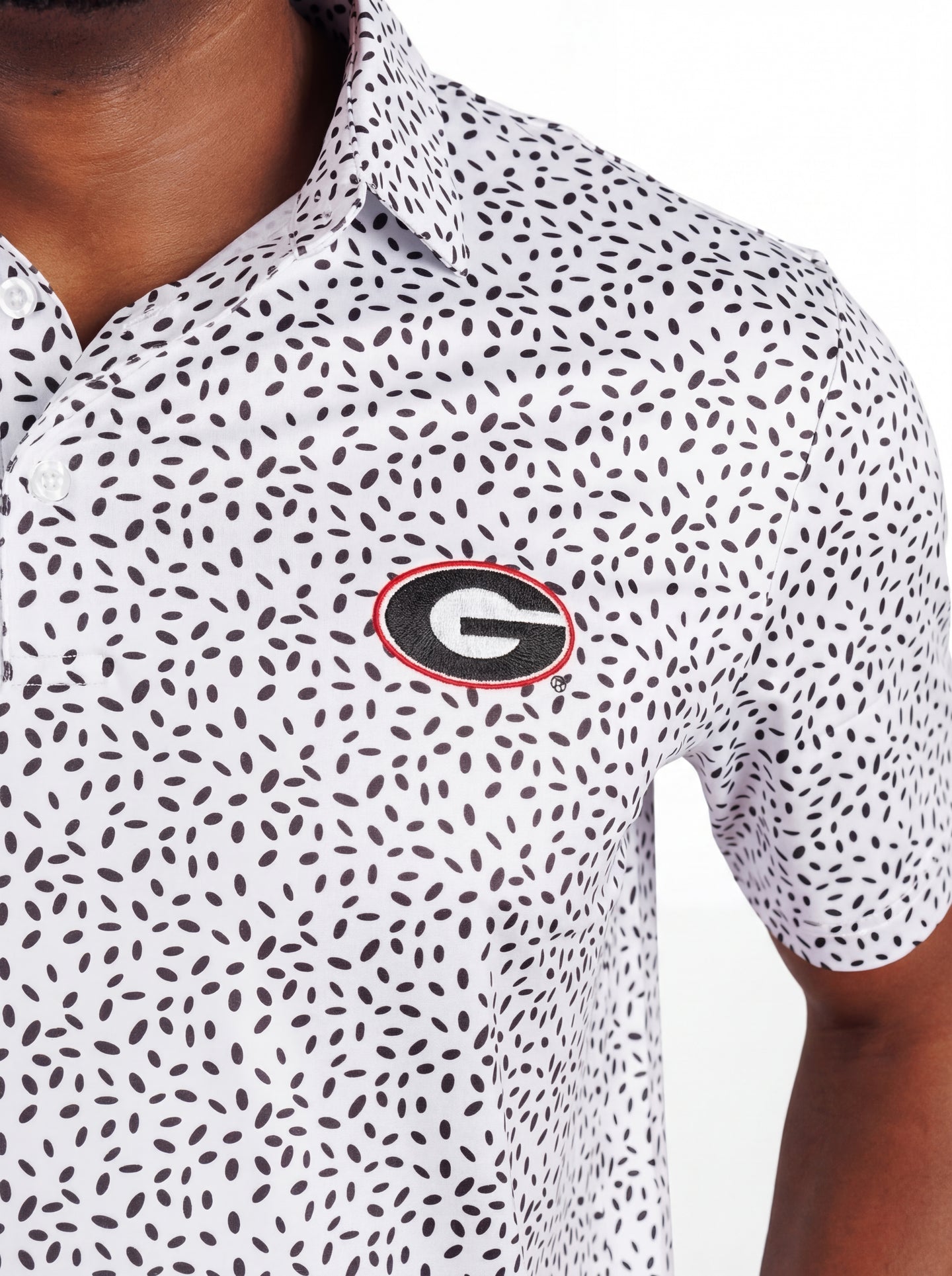 UGA Bulldogs men's "Splatter Mark" polo shirt by Arena Graffiti, featuring a colorful splatter design on a lightweight fabric.