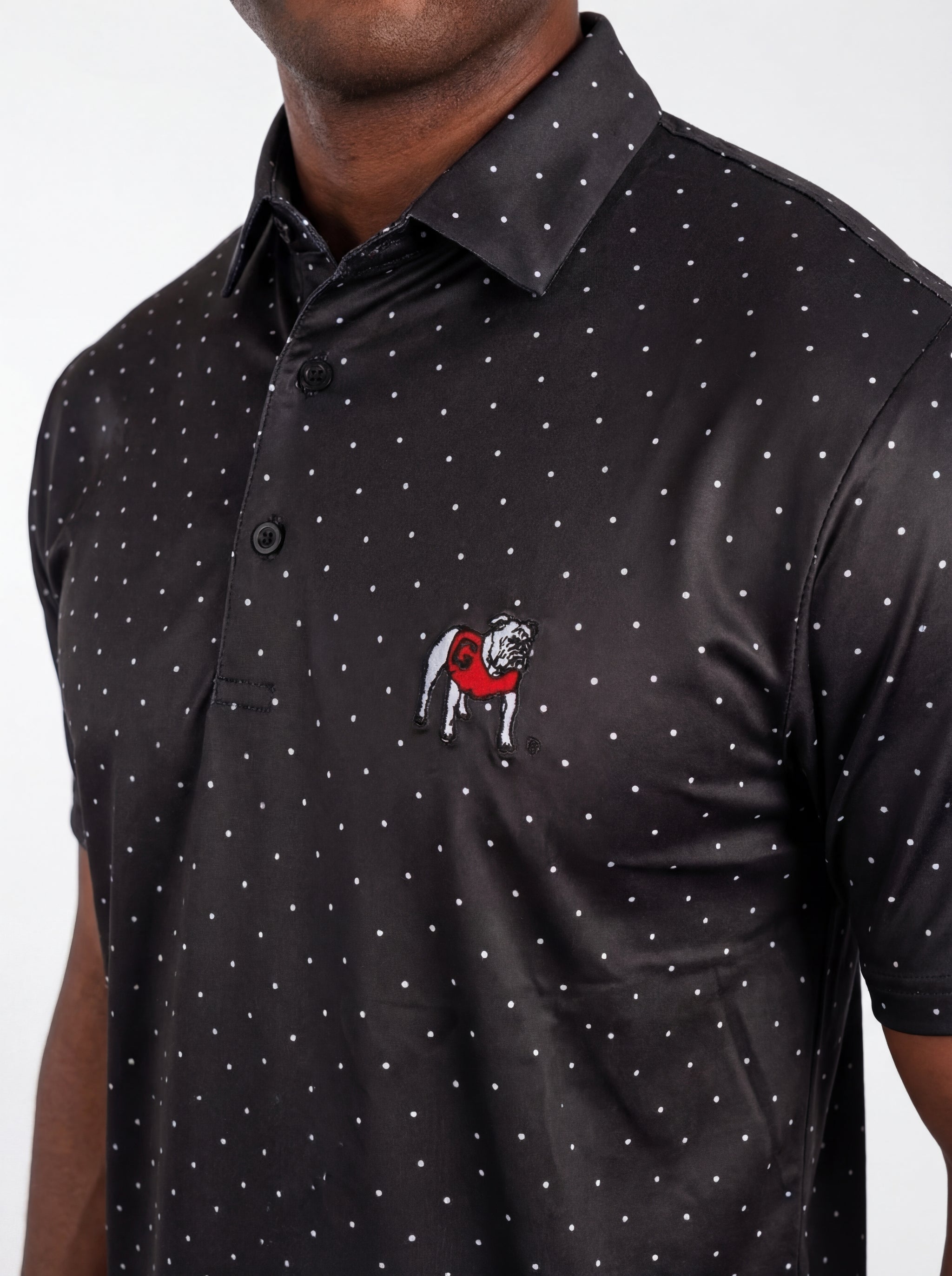 UGA Bulldogs men's Dot Dawg polo shirt by Arena Graffiti, featuring a navy fabric with a Bulldogs logo and dotted design.