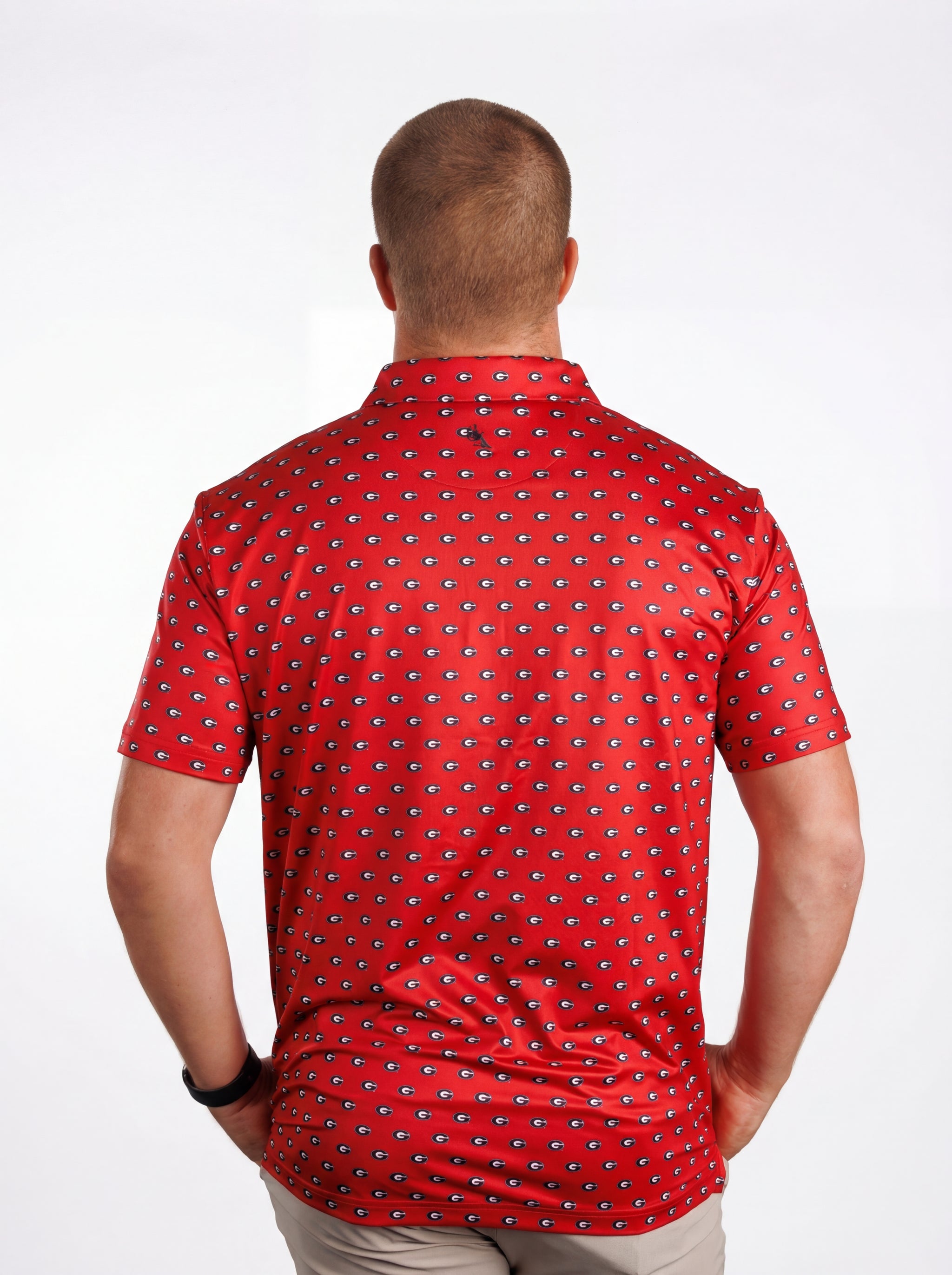 UGA Bulldogs men's “G Repeat” polo shirt by Arena Graffiti, featuring the team logo and classic design in a close-up view.