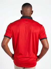 UGA Bulldogs men's Redline polo shirt by Arena Graffiti, features red and navy team logo and casual fit in the image.