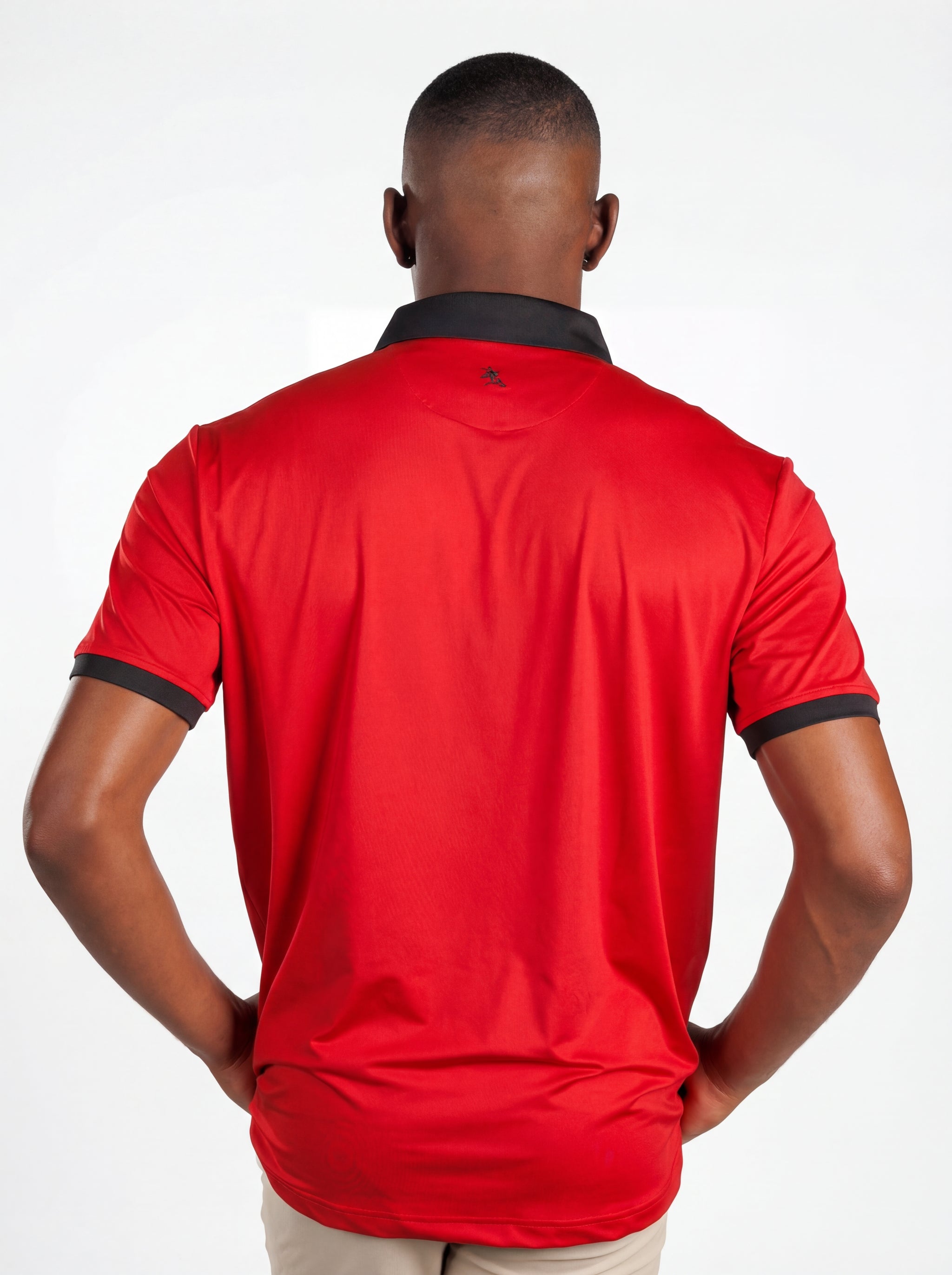 UGA Bulldogs men's Redline polo shirt by Arena Graffiti, features red and navy team logo and casual fit in the image.