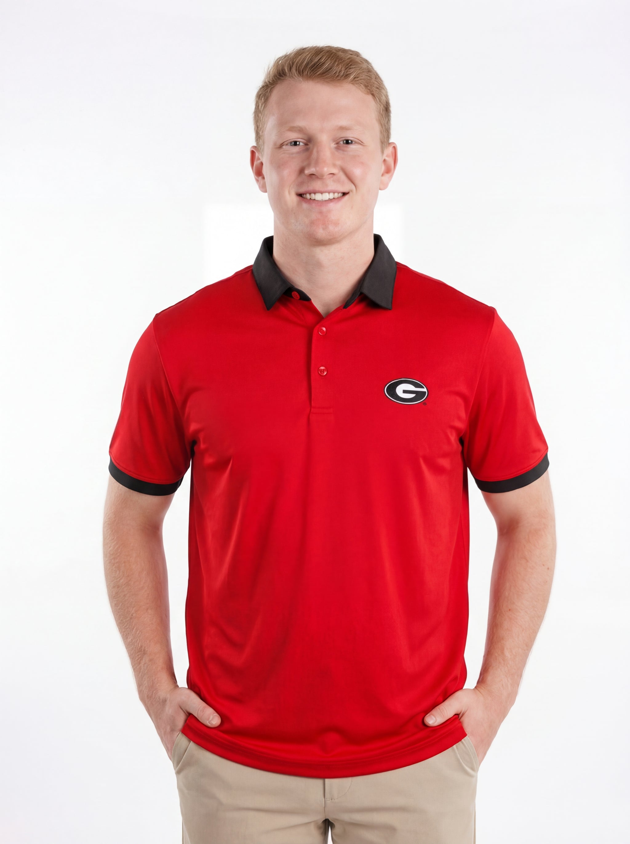 UGA Bulldogs men's Redline Polo by Arena Graffiti featuring red and navy colors with team logo embroidered on the chest.