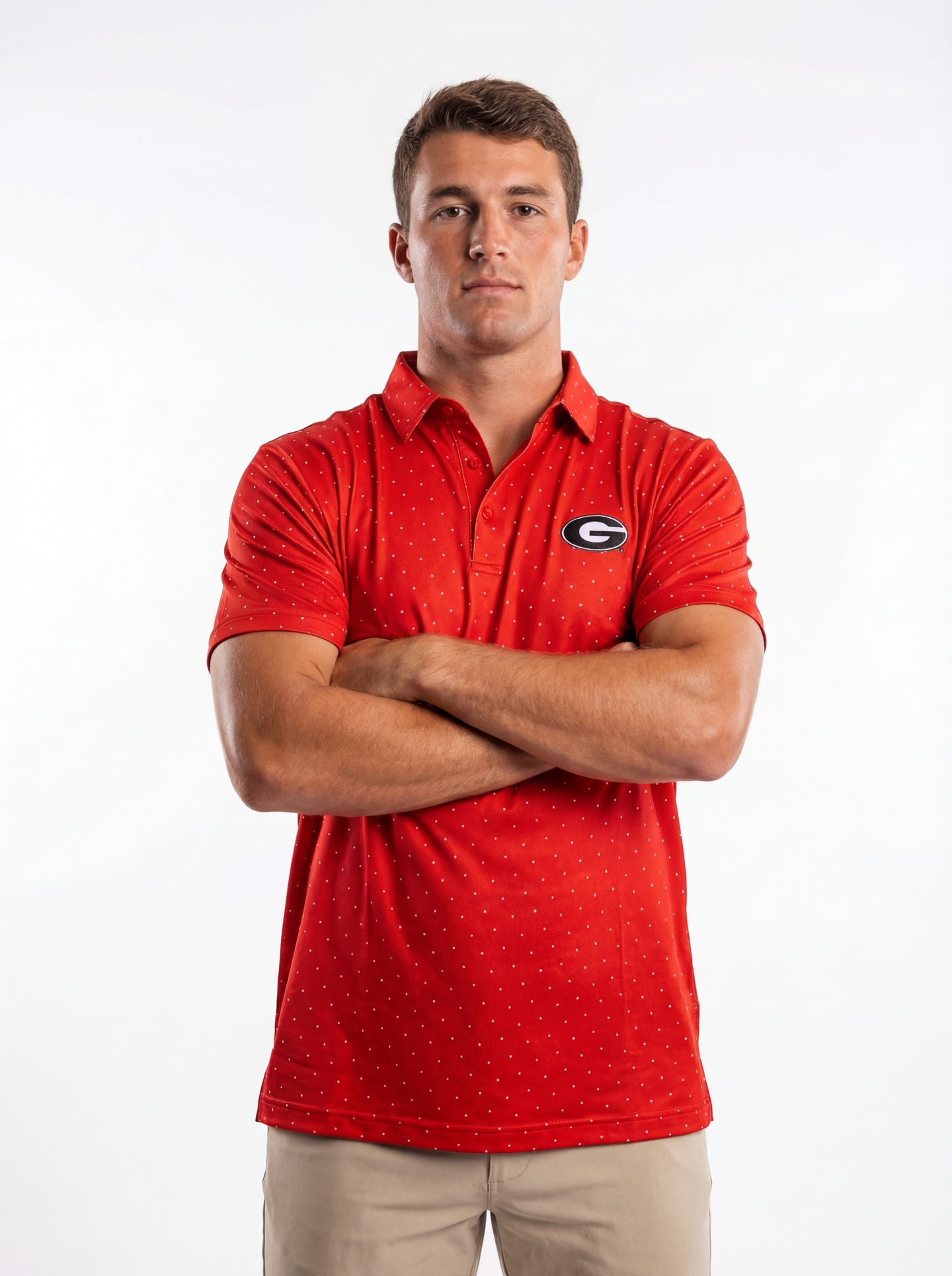 UGA Bulldogs men's red dot mark polo shirt by Arena Graffiti, showing the collar and front logo design.