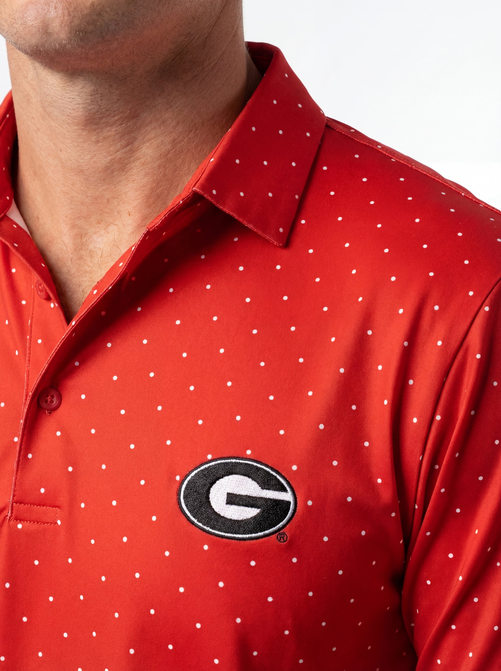 UGA Bulldogs men's red dot mark polo shirt by Arena Graffiti, featuring a classic collar and team logo design.