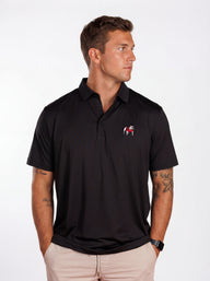 UGA Bulldogs men's Blackout Dawg polo shirt by Arena Graffiti, featuring a black fabric and team logo.