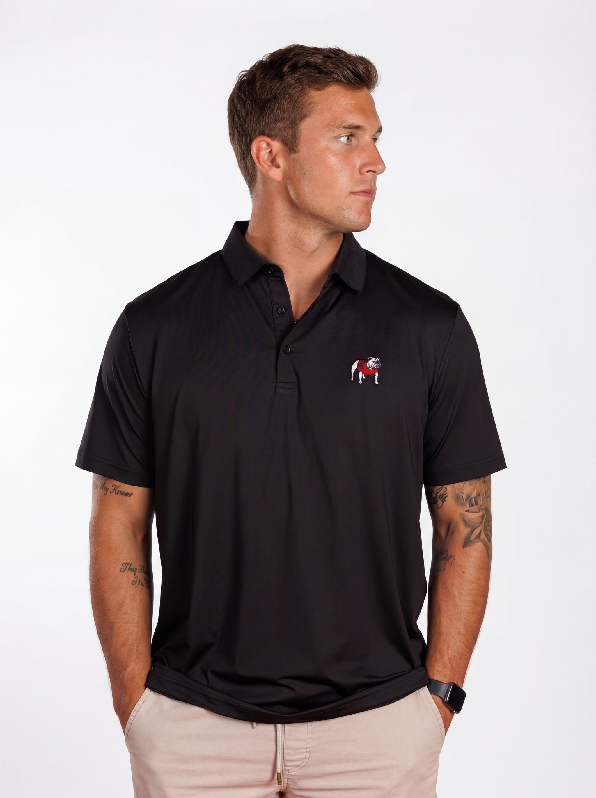 UGA Bulldogs men's Blackout Dawg polo shirt by Arena Graffiti, featuring a black fabric and team logo.