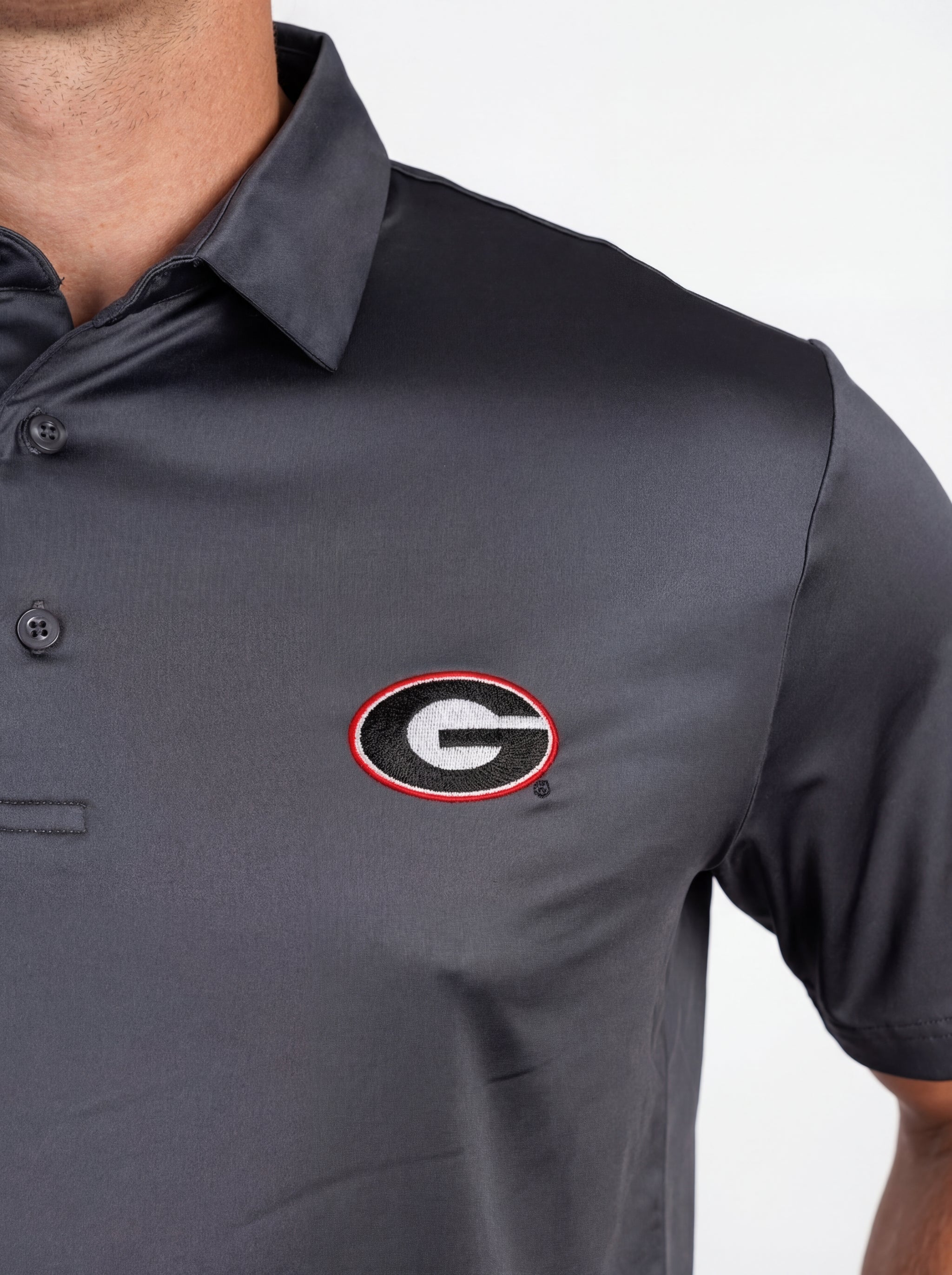 UGA Bulldogs men's grey "Mark" polo shirt by Arena Graffiti, featuring a classic collar and Bulldogs logo on the chest.