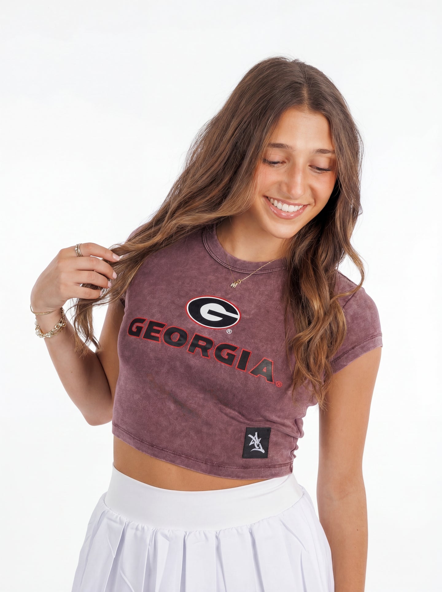 UGA Bulldogs women's vintage "G" crop top by Arena Graffiti, featuring a stylish distressed design and team logo.