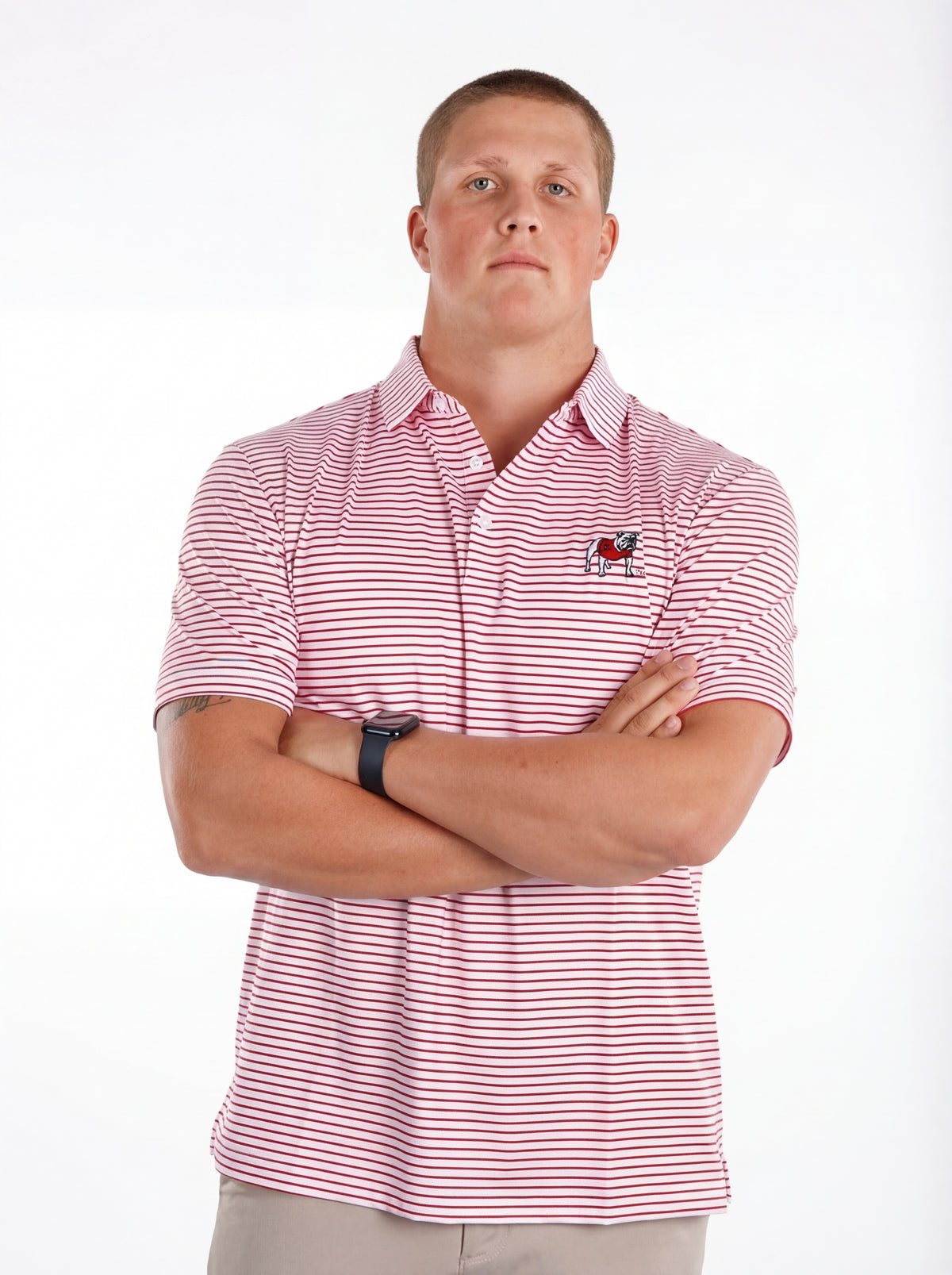 UGA Bulldogs men's "Standing Dawg" red and white striped polo shirt by Arena Graffiti, showing the front view with logo details.