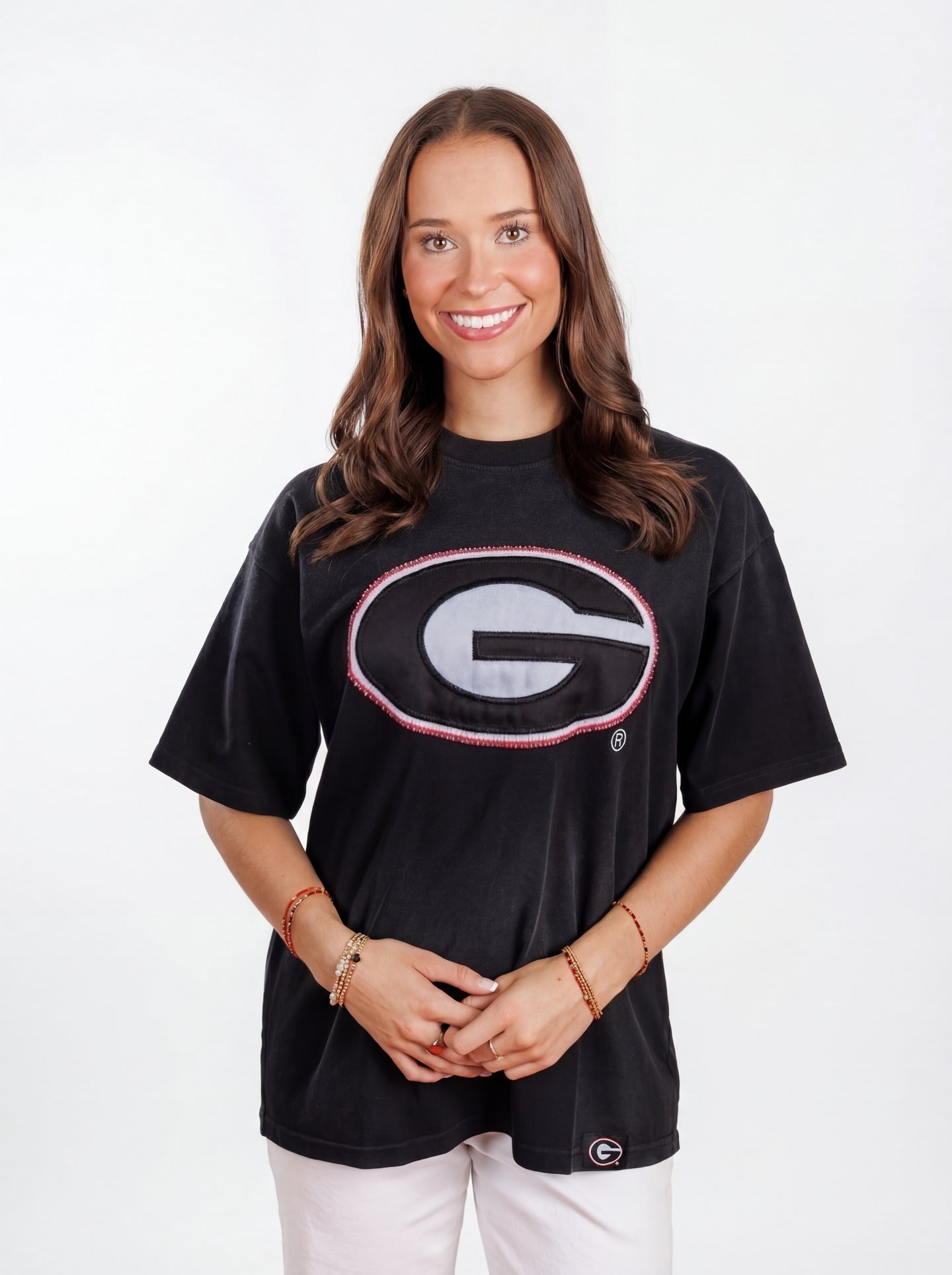 UGA Bulldogs women's "Reverse G" T-shirt by Arena Graffiti featuring a bold graphic design and team logo on white fabric.