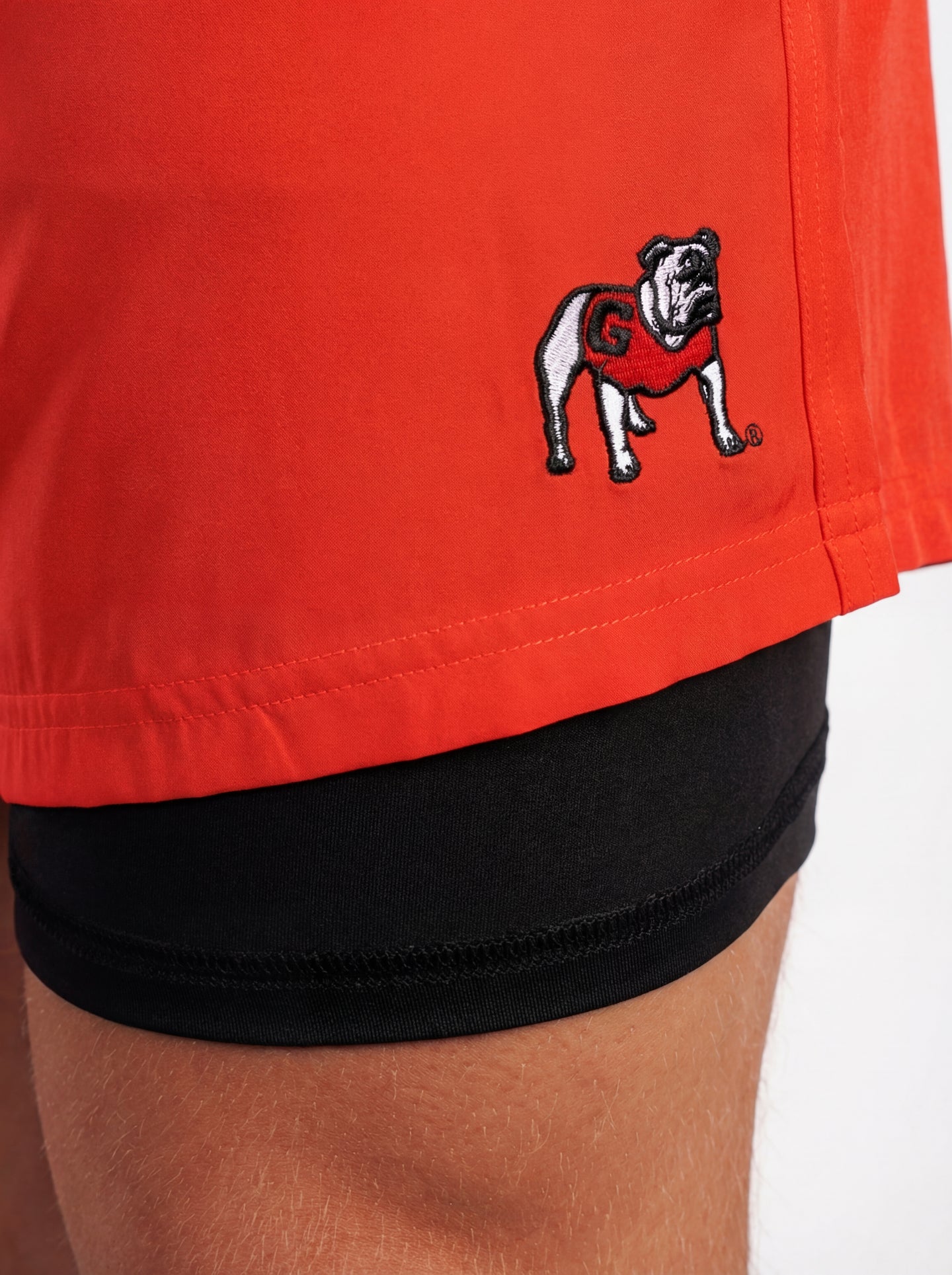 UGA Bulldogs men's "Standing Dawg" shorts by Arena Graffiti featuring team logo and athletic design on navy fabric.