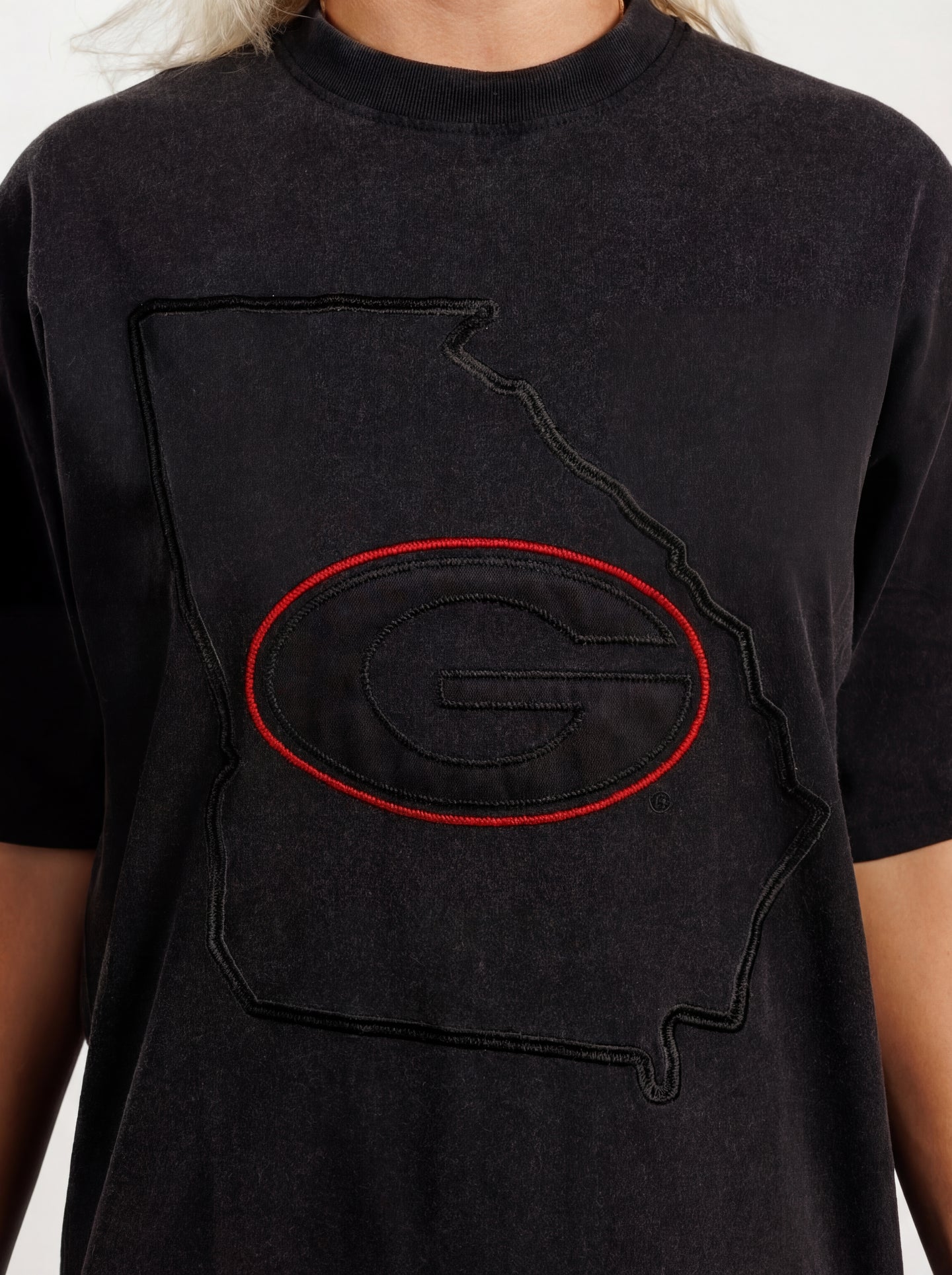 UGA Bulldogs women’s “Reverse State” tee by Arena Graffiti featuring a graphic design of the Georgia state outline on white fabric