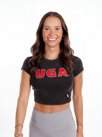 Black UGA Bulldogs women’s “Blackout UGA” crop top by Arena Graffiti featuring team logo and black fabric, casual athletic style.