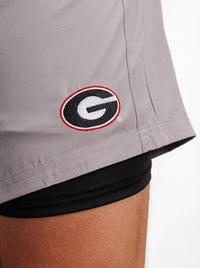 UGA Bulldogs men's Oval G shorts by Arena Graffiti, featuring team logo and athletic design, black fabric with blue accents.