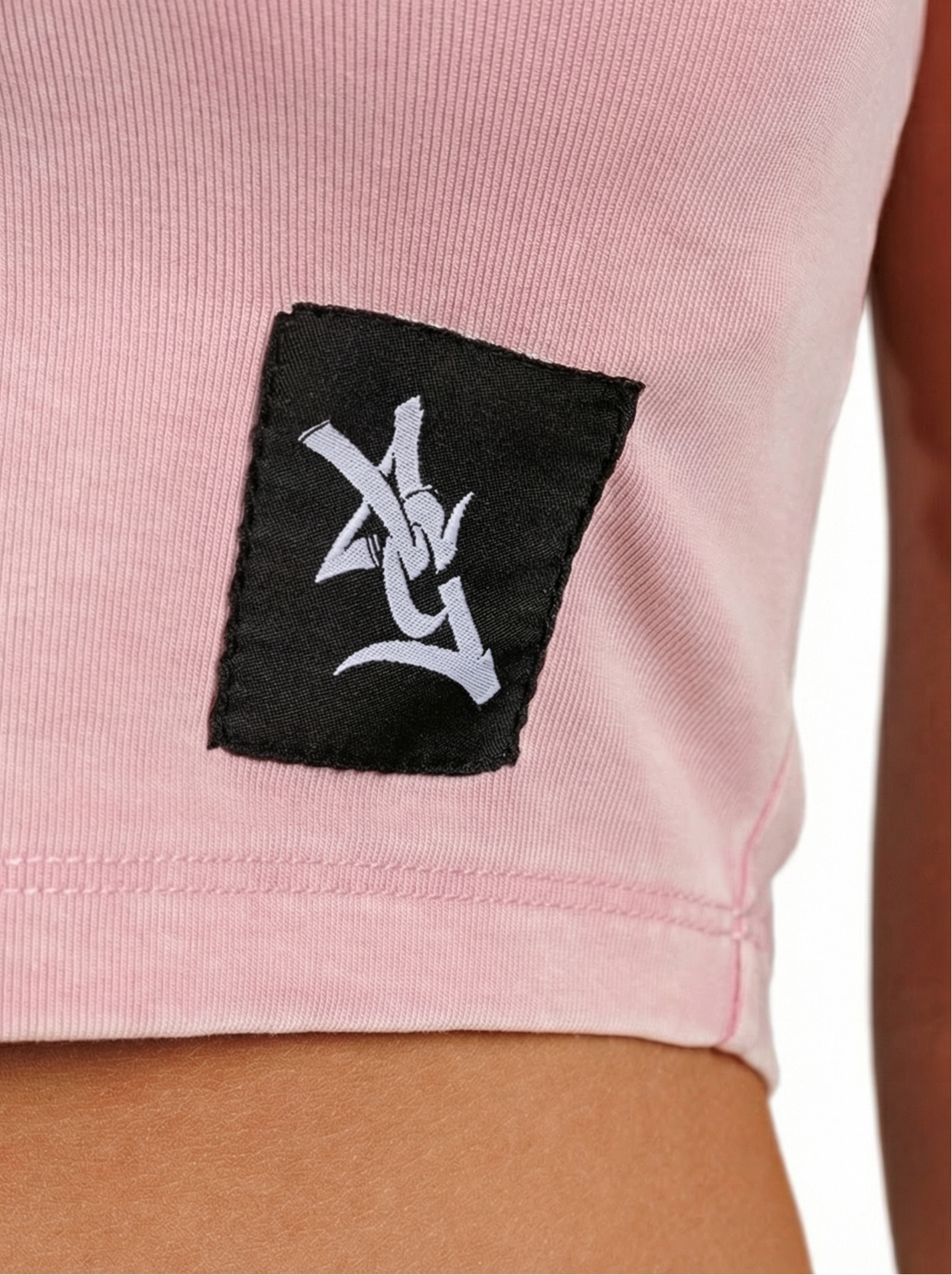 UGA Bulldogs women’s pink crop top with "Oval G" logo, by Arena Graffiti, featuring a fitted design and bold team branding.
